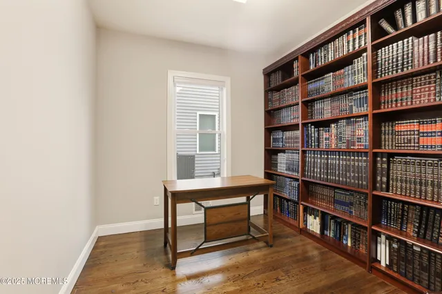 a view of a workspace with furniture
