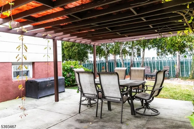 a patio with an outdoor seating