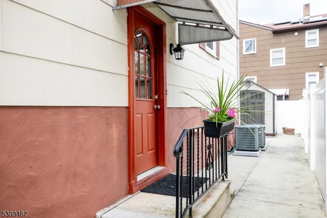 a view of entryway with wooden floor