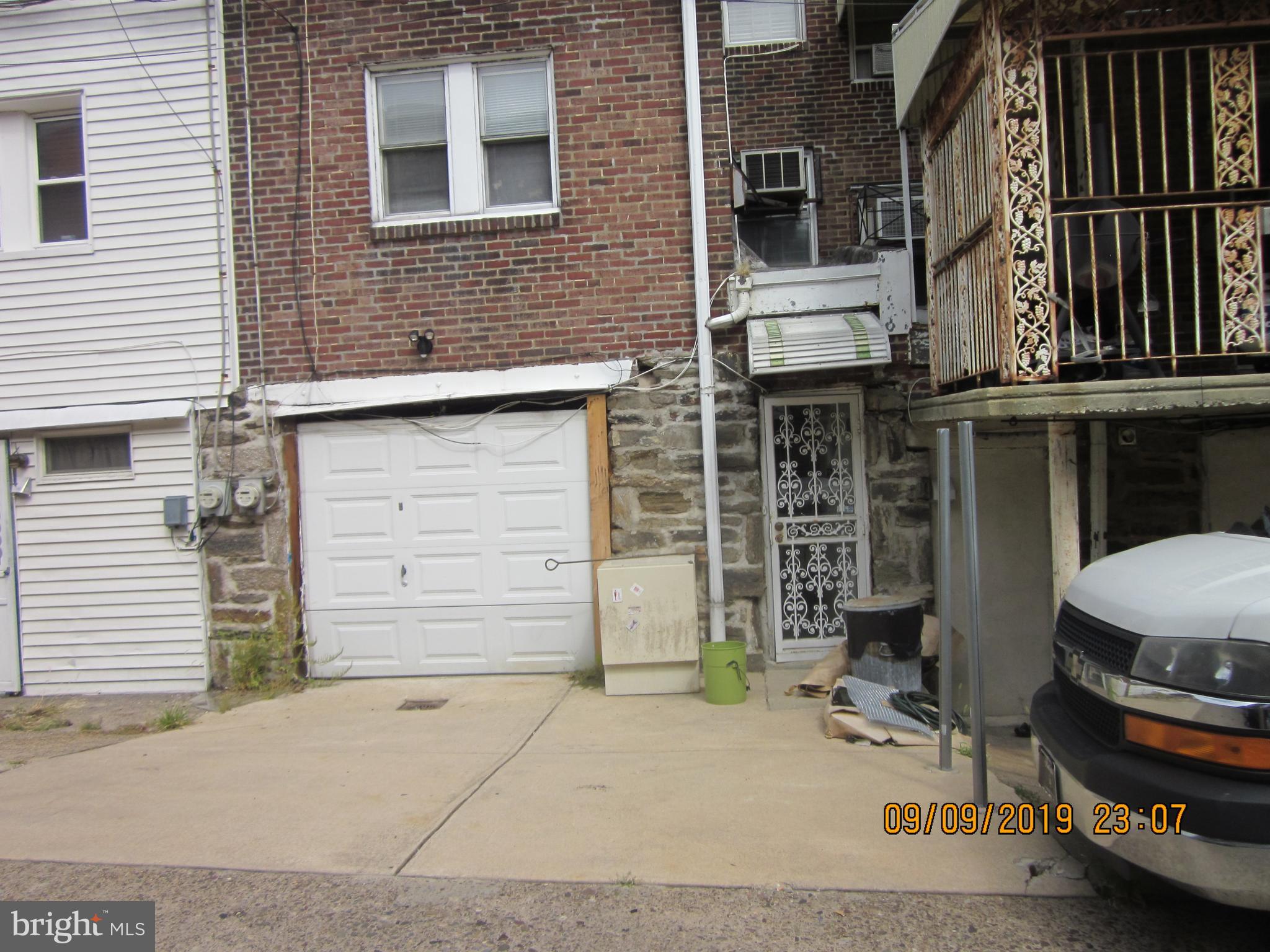 5724 Nassau Road Philadelphia, PA 19131 - Photo 17 of 18 Exterior rear with garage