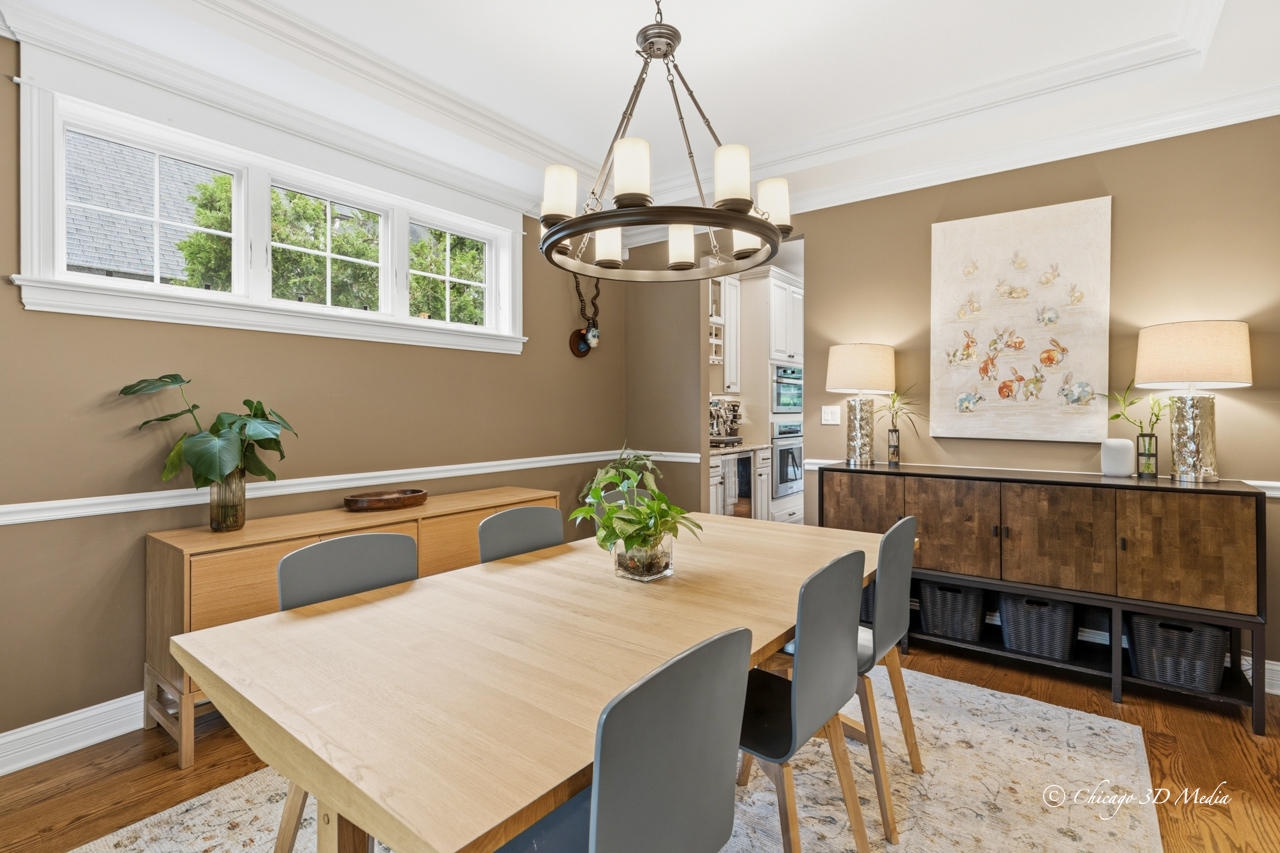 306 17th Street Wilmette, IL 60091 - Photo 21 of 48 a view of a dining room with furniture and chandelier