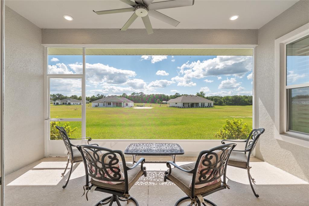 1929 Northwest 85th Loop Ocala, FL 34475 - Photo 24 of 55 a view of a dining room with furniture window and outside view