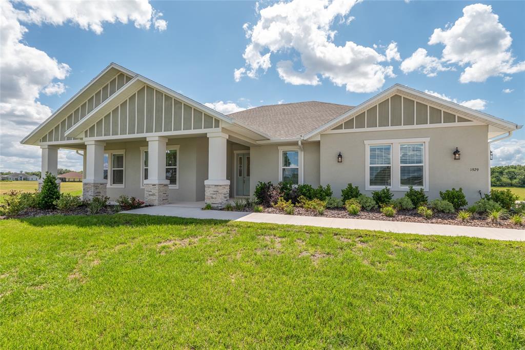 1929 Northwest 85th Loop Ocala, FL 34475 - Photo 4 of 55 a front view of house with yard and green space