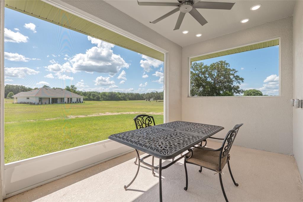 1929 Northwest 85th Loop Ocala, FL 34475 - Photo 46 of 55 a view of a dining room with furniture window and outside view
