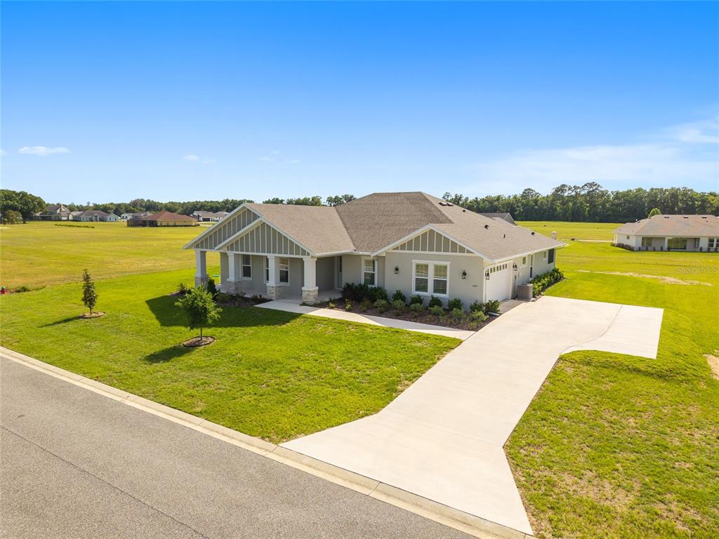 1929 Northwest 85th Loop Ocala, FL 34475 - Photo 54 of 55 a view of a house with a ocean view