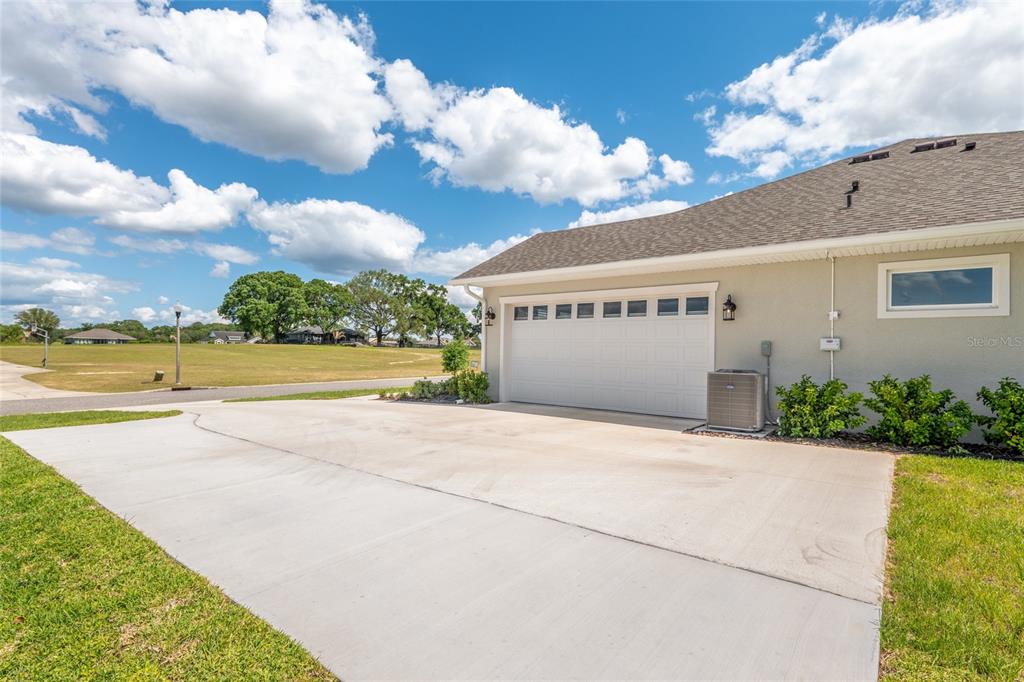 1929 Northwest 85th Loop Ocala, FL 34475 - Photo 6 of 55 a view of an ocean with a big yard