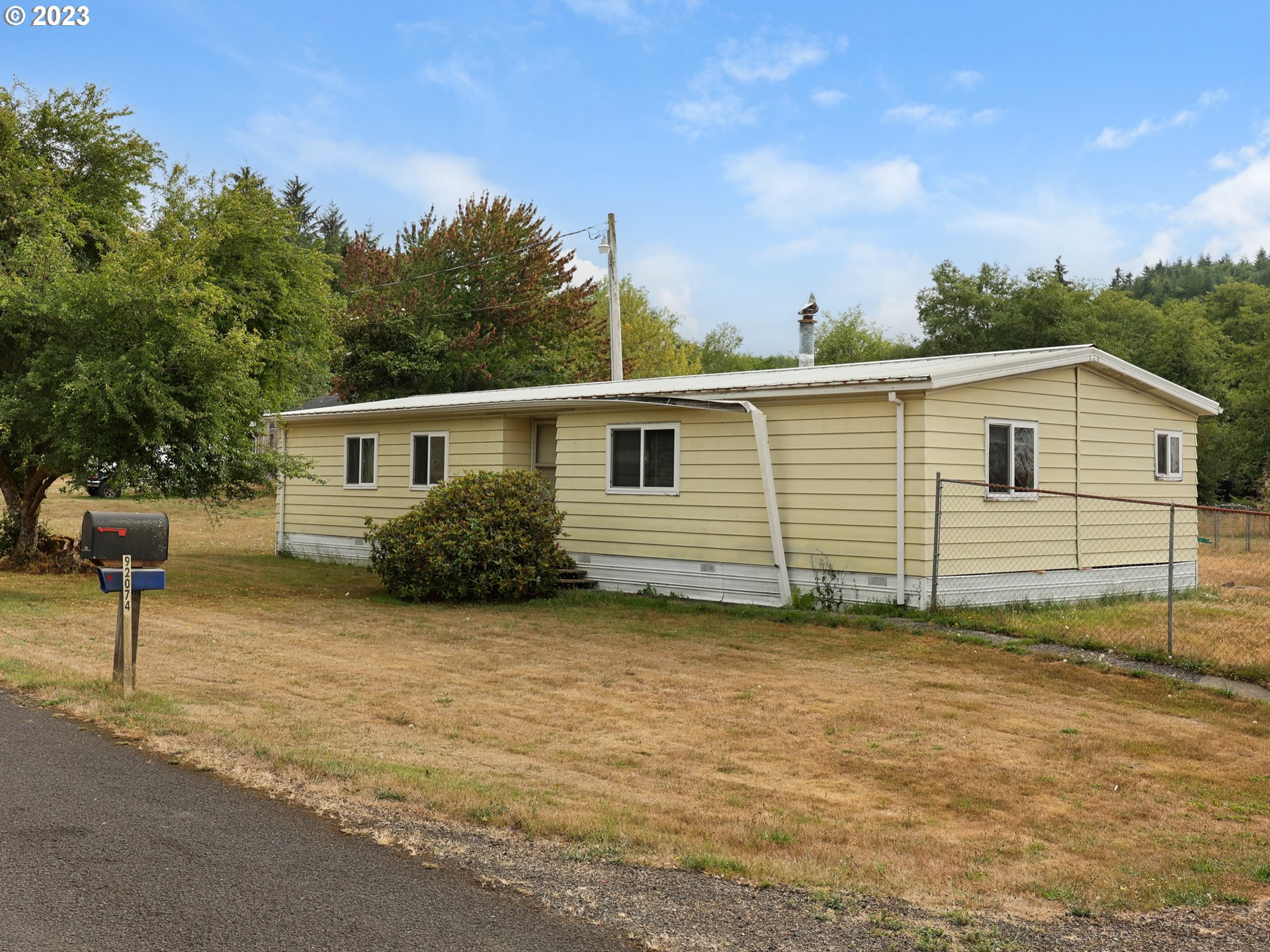 92074 Maki Road Astoria, OR 97103 - Photo 1 of 36 a view of a house with a backyard