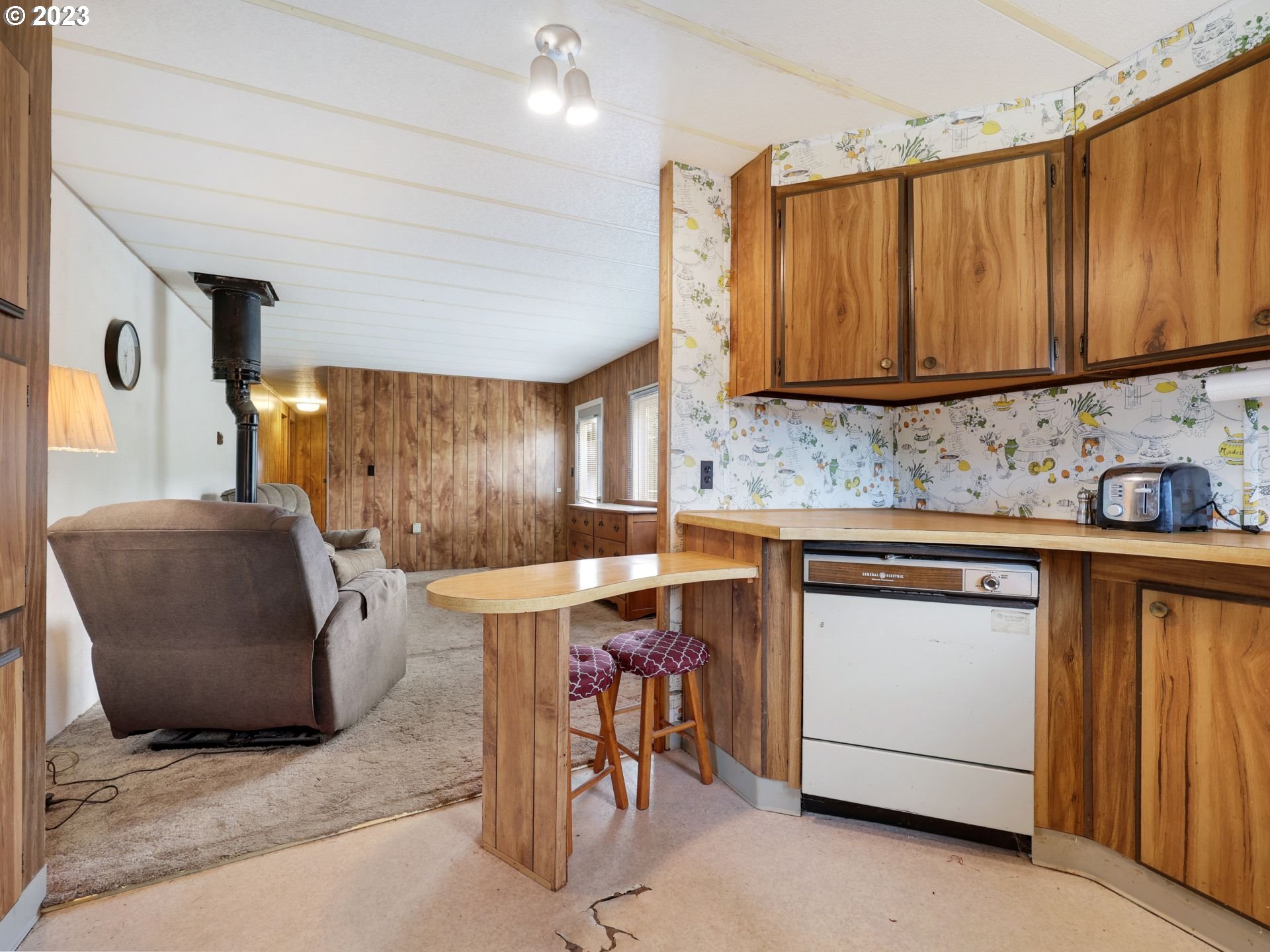 92074 Maki Road Astoria, OR 97103 - Photo 15 of 36 a kitchen with a sink cabinets and window