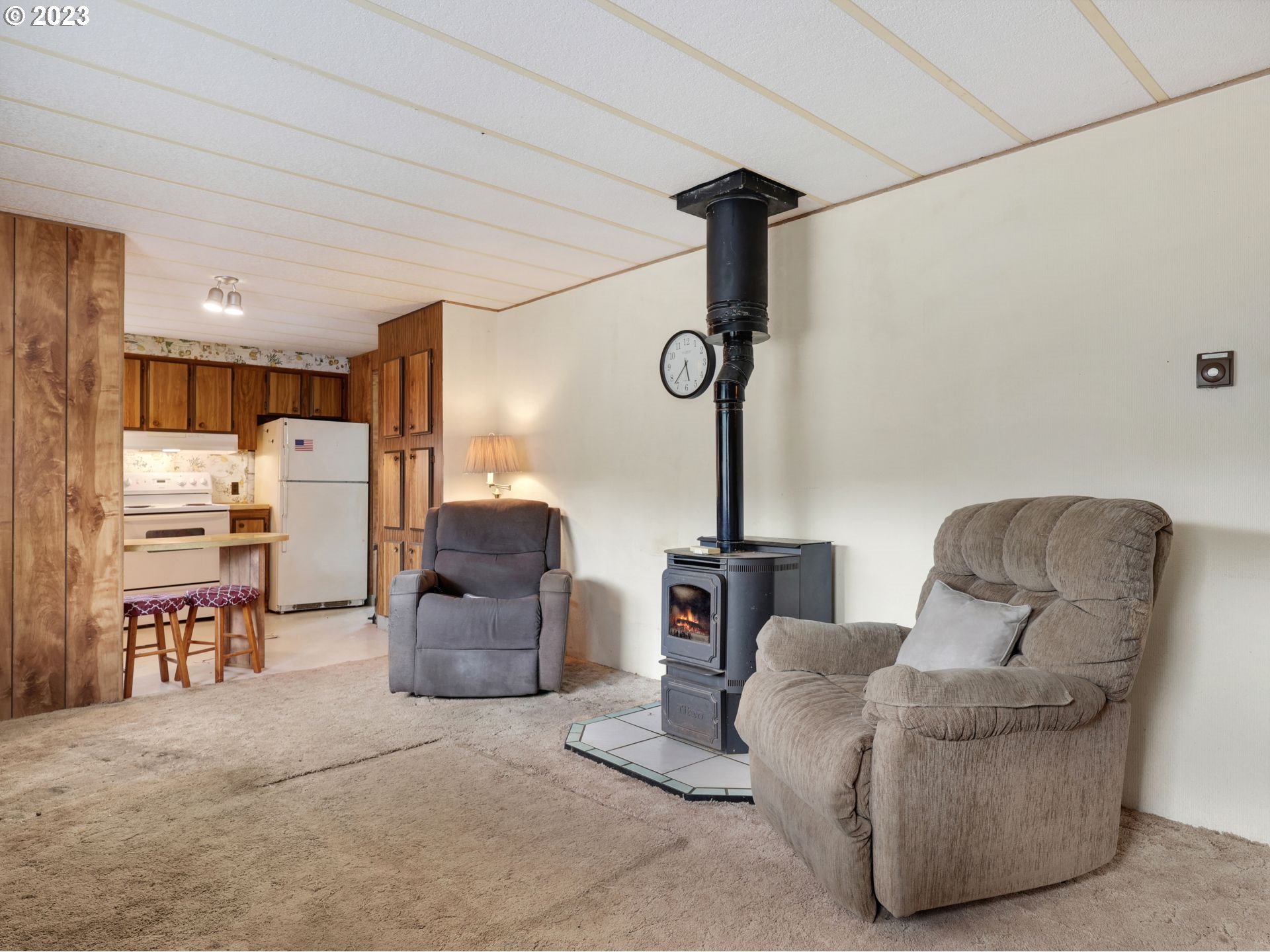 92074 Maki Road Astoria, OR 97103 - Photo 19 of 36 a living room with furniture and a chandelier