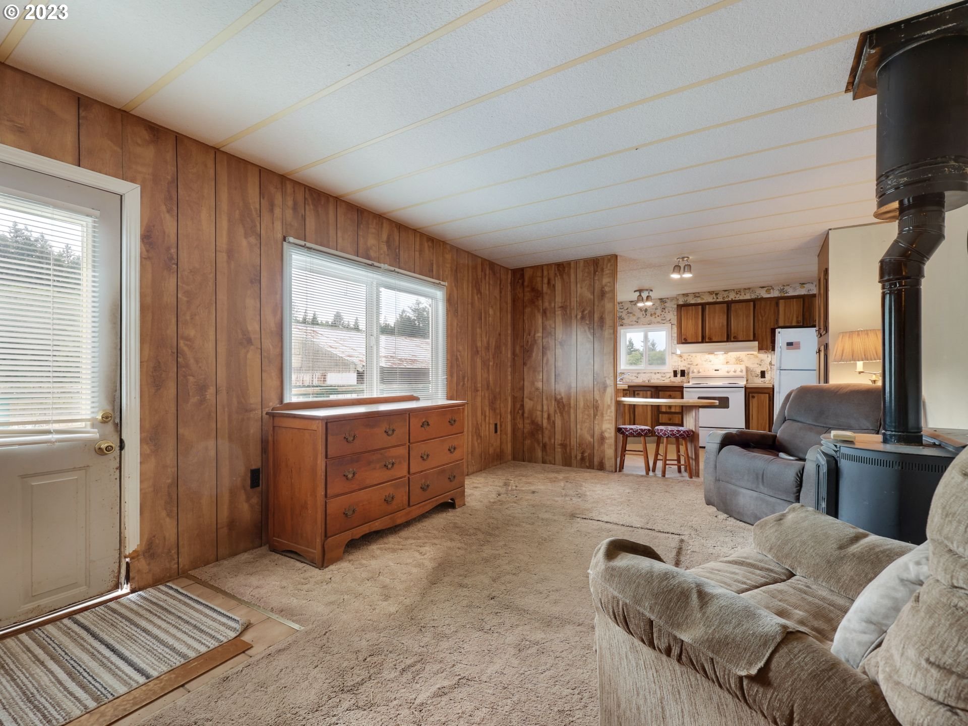 92074 Maki Road Astoria, OR 97103 - Photo 20 of 36 a bedroom with furniture and a window