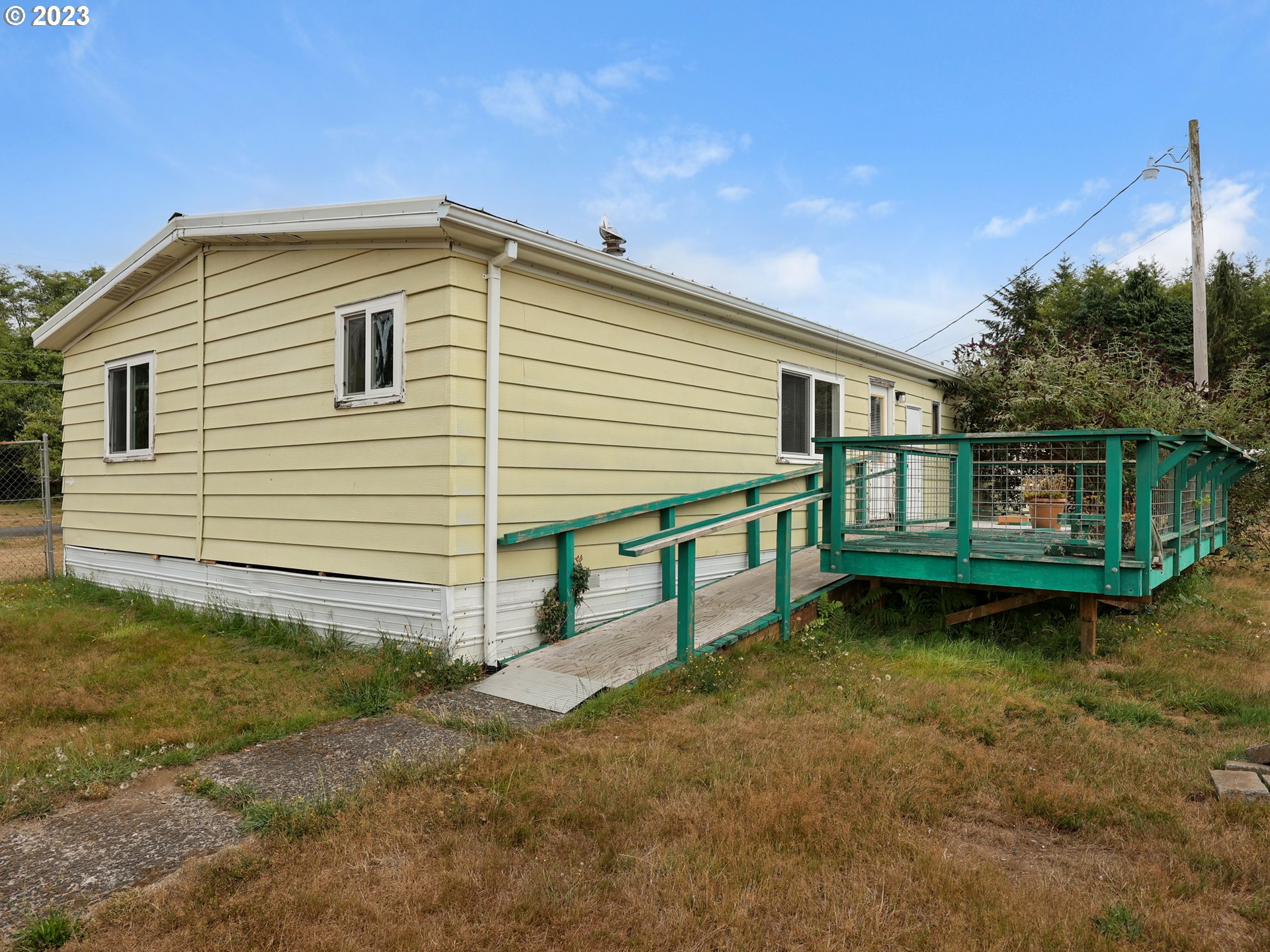 92074 Maki Road Astoria, OR 97103 - Photo 2 of 36 a view of a house with a yard