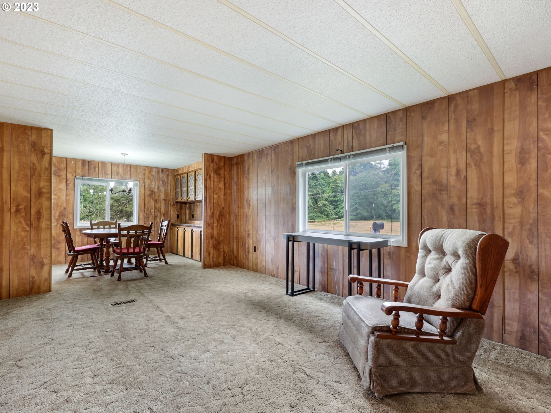 92074 Maki Road Astoria, OR 97103 - Photo 4 of 36 a living room with furniture and a window