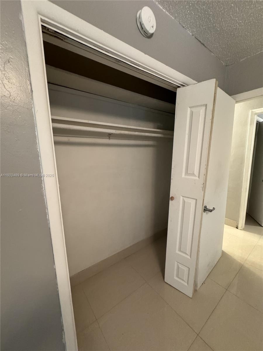 213 Southwest 5th Street Hallandale Beach, FL 33009 - Photo 15 of 17 a view of closet