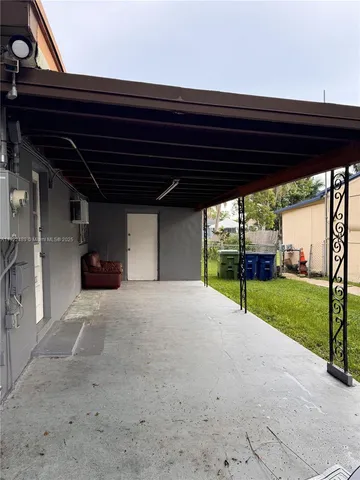 a view of an empty room with a yard