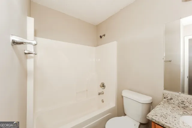 a view of a back yard of the house