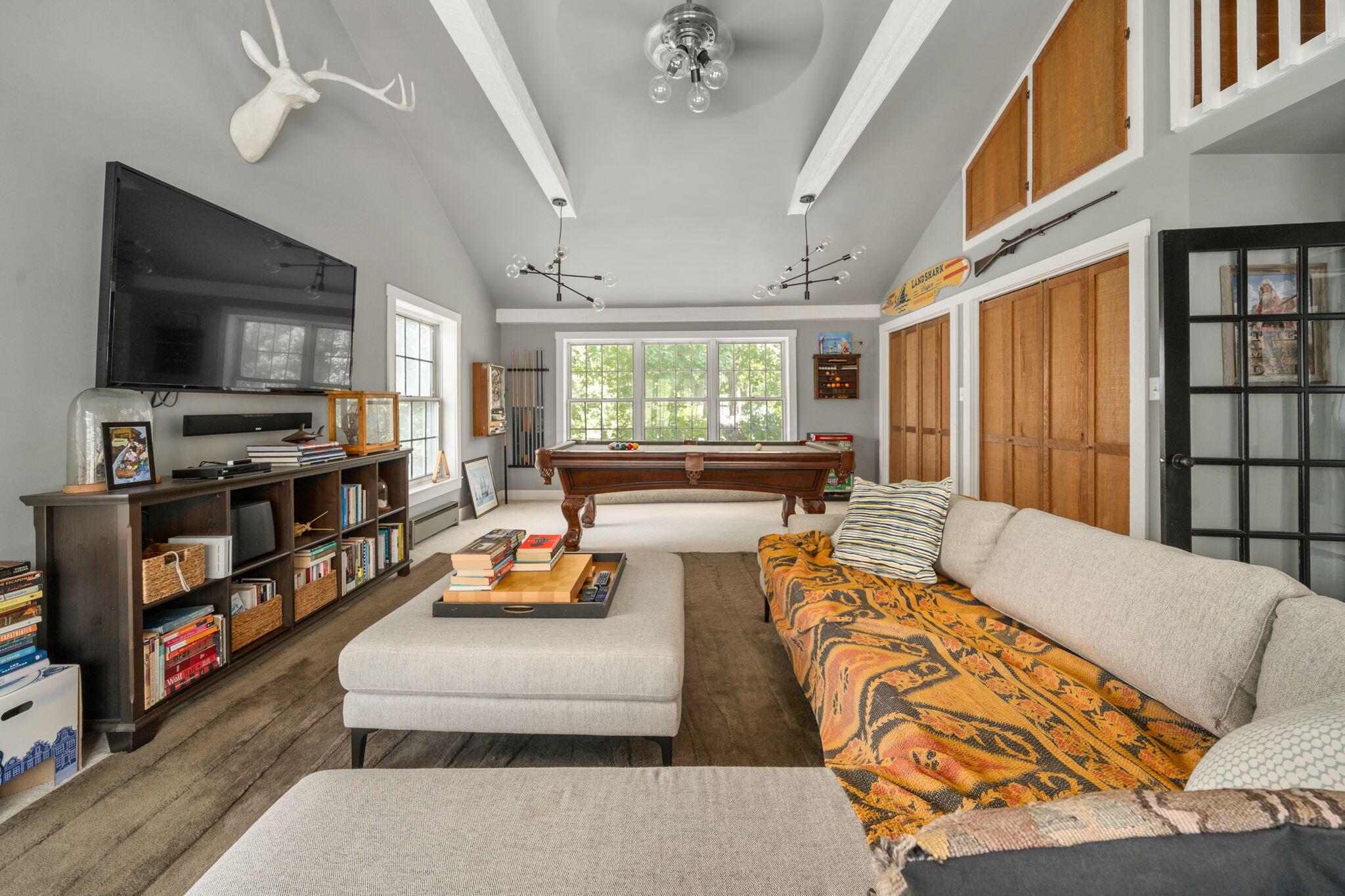 4356 Hawk Road Mechanicsburg, OH 43044 - Photo 41 of 115 3rd Floor Rec Room with vaulted ceiling