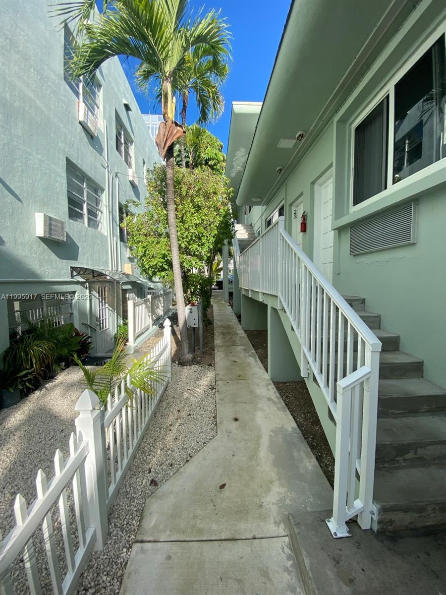 9056 Collins Avenue, Unit 23 Surfside, FL 33154 - Photo 4 of 12 a view of an outdoor space with a porch