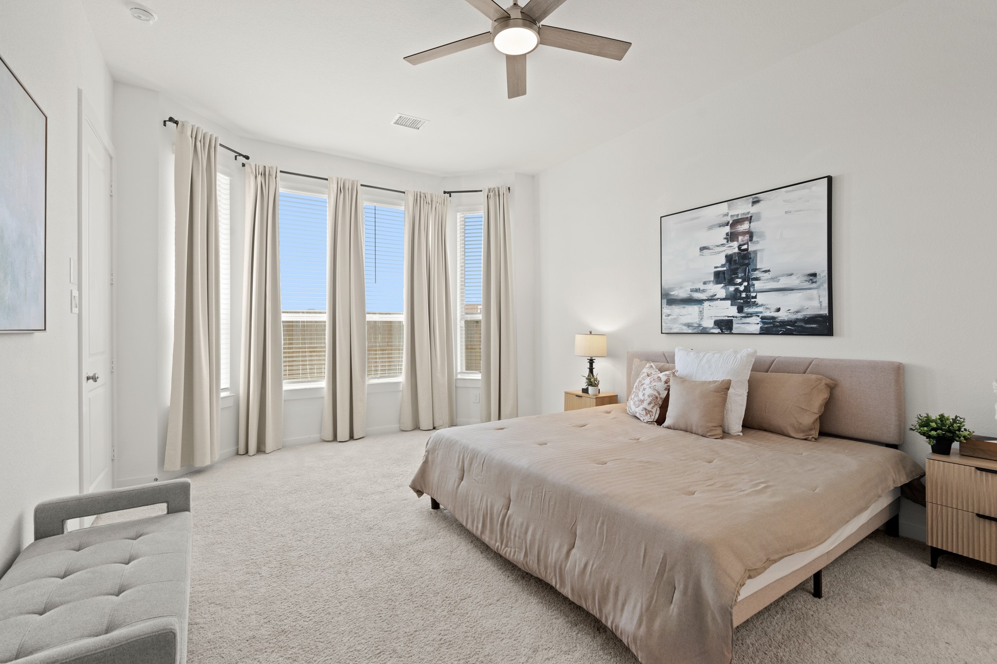 7303 Compass Drive Katy, TX 77493 - Photo 15 of 31 a bedroom with a large bed and a window