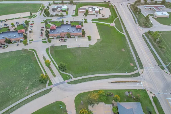 swimming pool view with garden