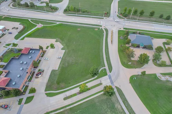 an aerial view of a pool patio swimming pool and outdoor seating