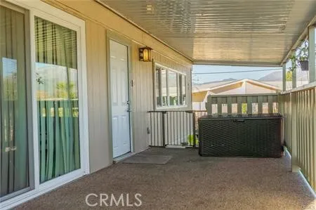 an aerial view of a house with outdoor space