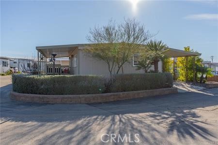 1134 Villa Calimesa Lane, Unit 42 Calimesa, CA 92320 - Photo 17 of 36 a view of a yard