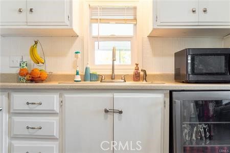 1134 Villa Calimesa Lane, Unit 42 Calimesa, CA 92320 - Photo 20 of 36 a kitchen with a sink and a window
