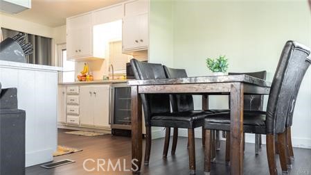 1134 Villa Calimesa Lane, Unit 42 Calimesa, CA 92320 - Photo 23 of 36 a view of a dining room with furniture and wooden floor