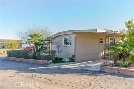 a front view of a house with yard