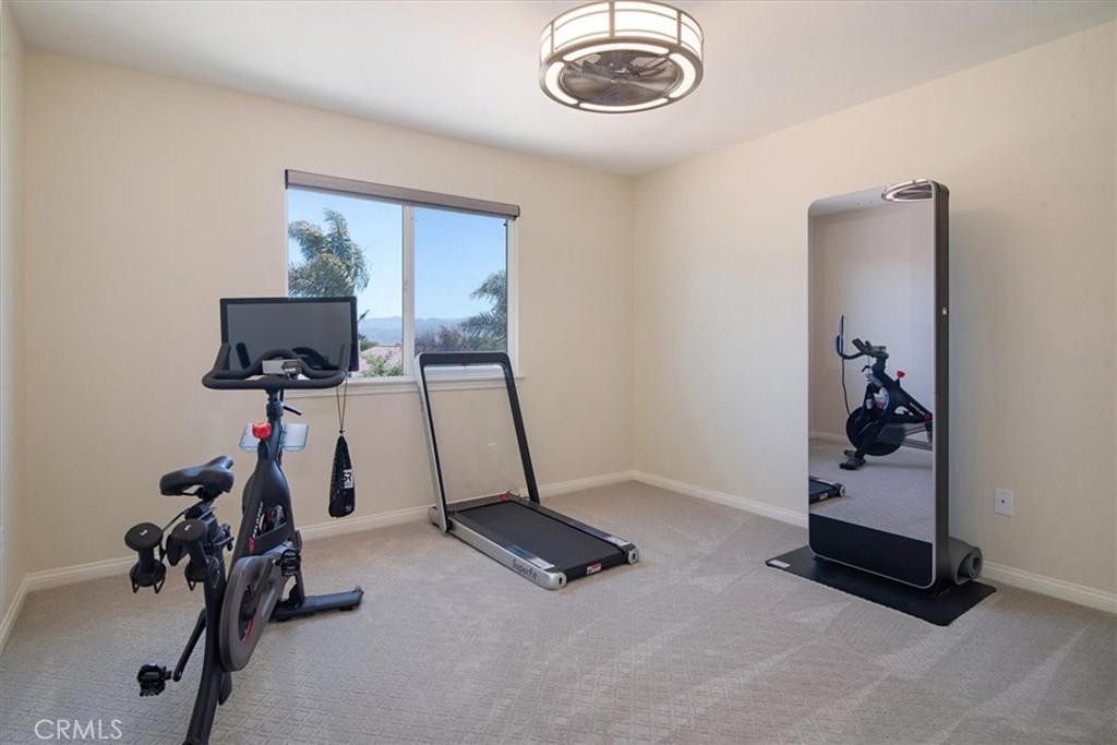 204 Brisa Del Mar Lompoc, CA 93436 - Photo 18 of 33 a room with gym equipment and windows