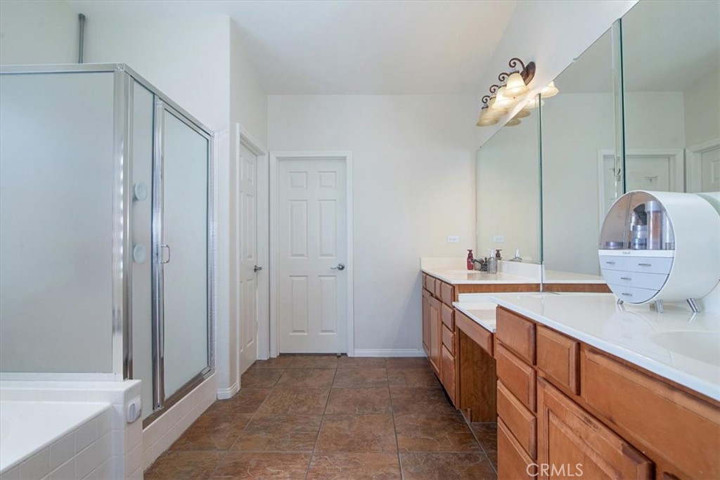 204 Brisa Del Mar Lompoc, CA 93436 - Photo 24 of 33 a bathroom with a sink and a mirror