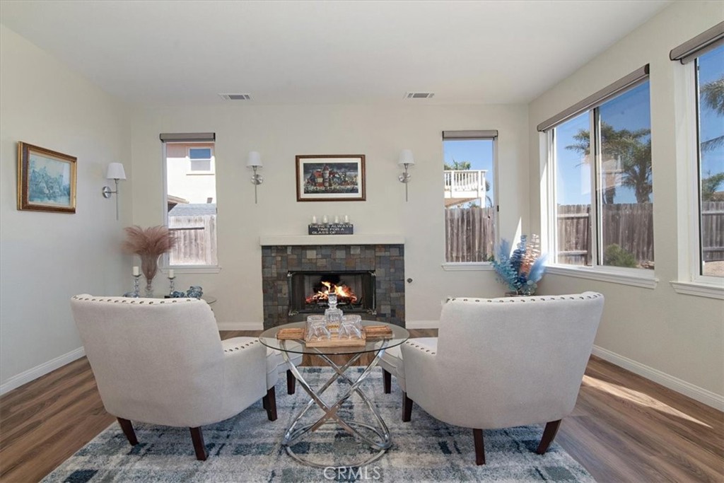 204 Brisa Del Mar Lompoc, CA 93436 - Photo 4 of 33 a living room with furniture a table and a potted plant