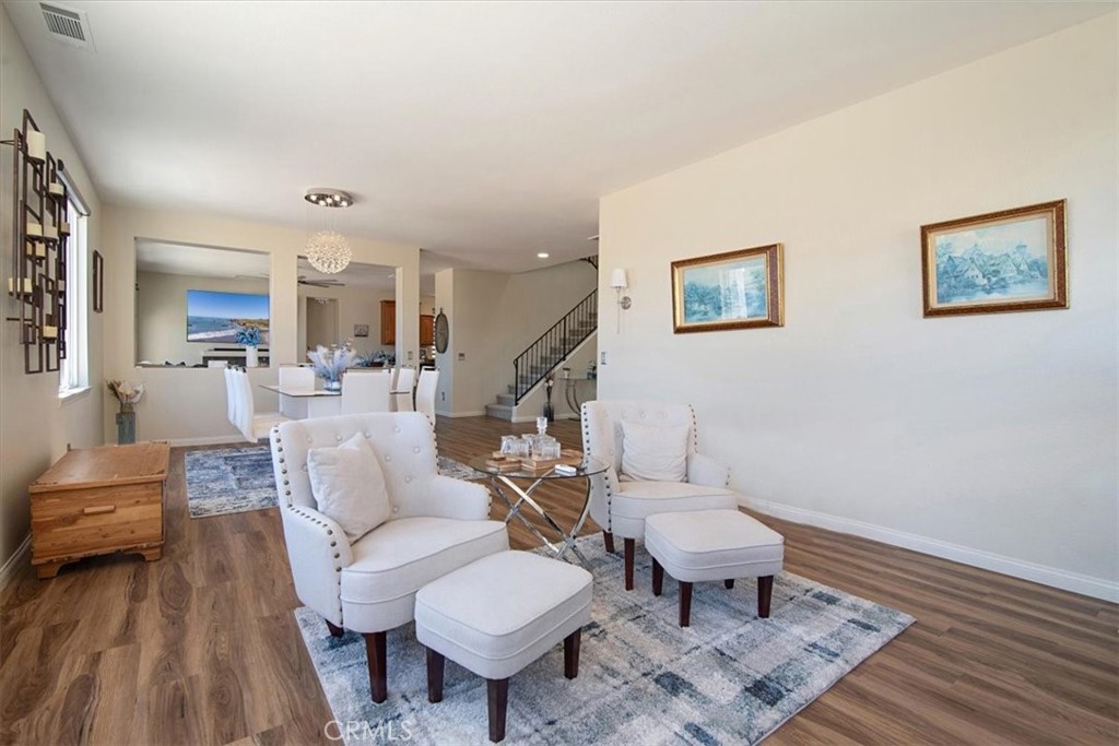 204 Brisa Del Mar Lompoc, CA 93436 - Photo 5 of 33 a living room with furniture and a wooden floor