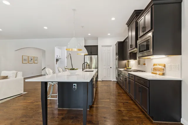 a bathroom with a bathtub and window