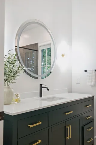 a front view of a house with a yard table and chairs