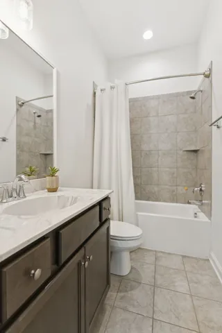 a view of a yard with a tree