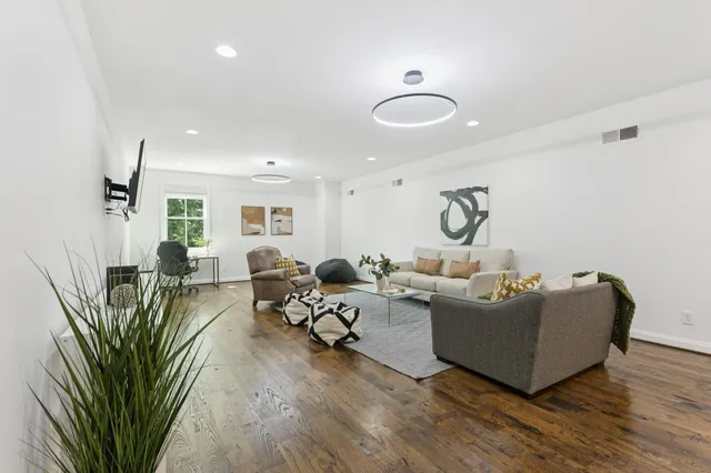 an aerial view of residential houses and outdoor space