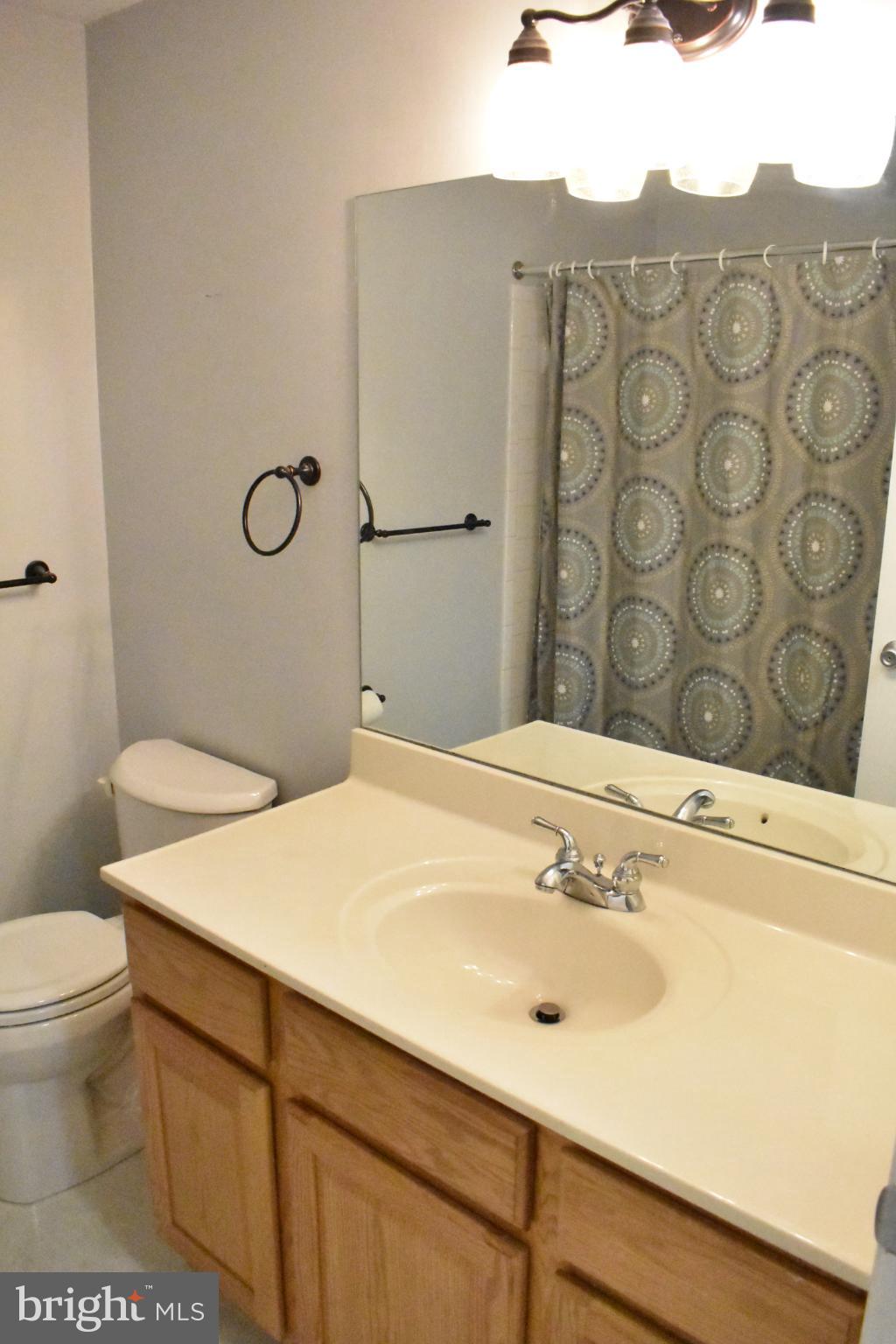 67 Devonne Drive Fredericksburg, VA 22407 - Photo 13 of 35 a bathroom with a sink and a mirror