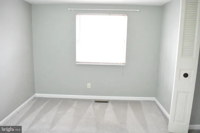 a view of a small space with a window