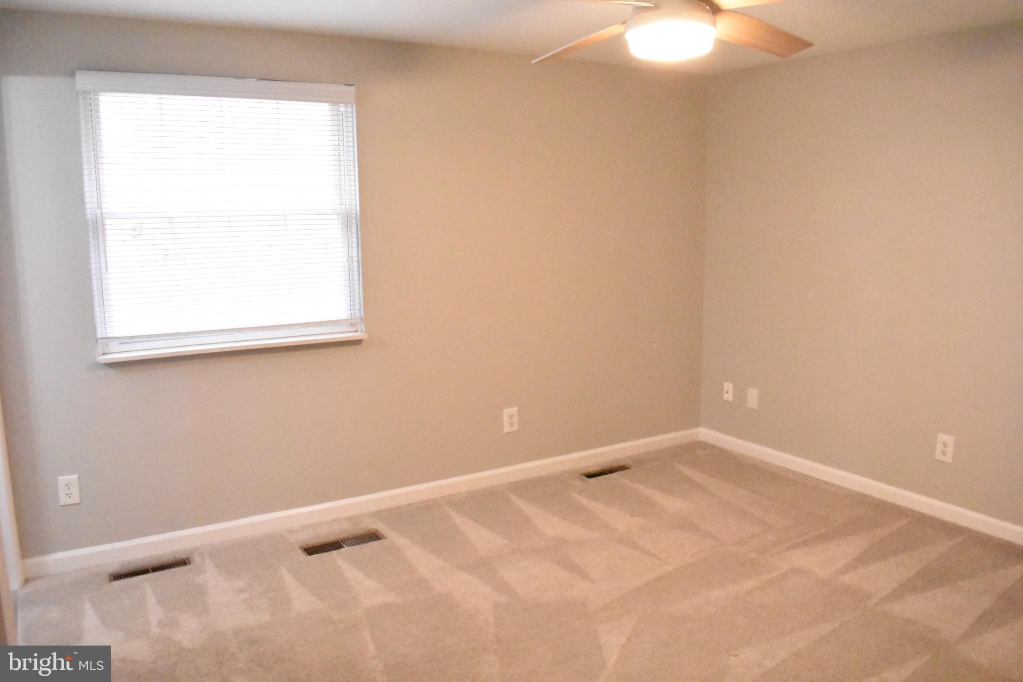67 Devonne Drive Fredericksburg, VA 22407 - Photo 20 of 35 an empty room with a window