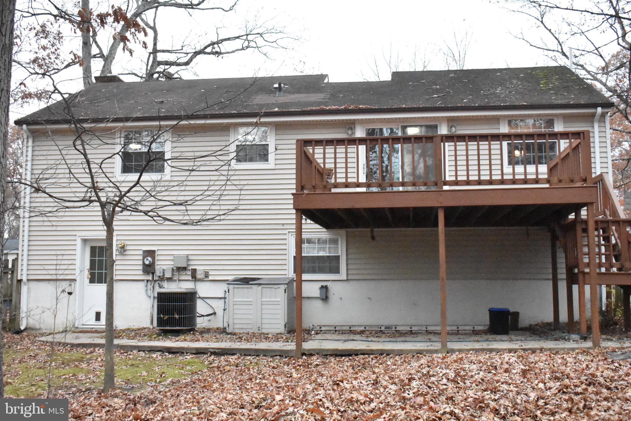 67 Devonne Drive Fredericksburg, VA 22407 - Photo 32 of 35 a front view of a house with a garden