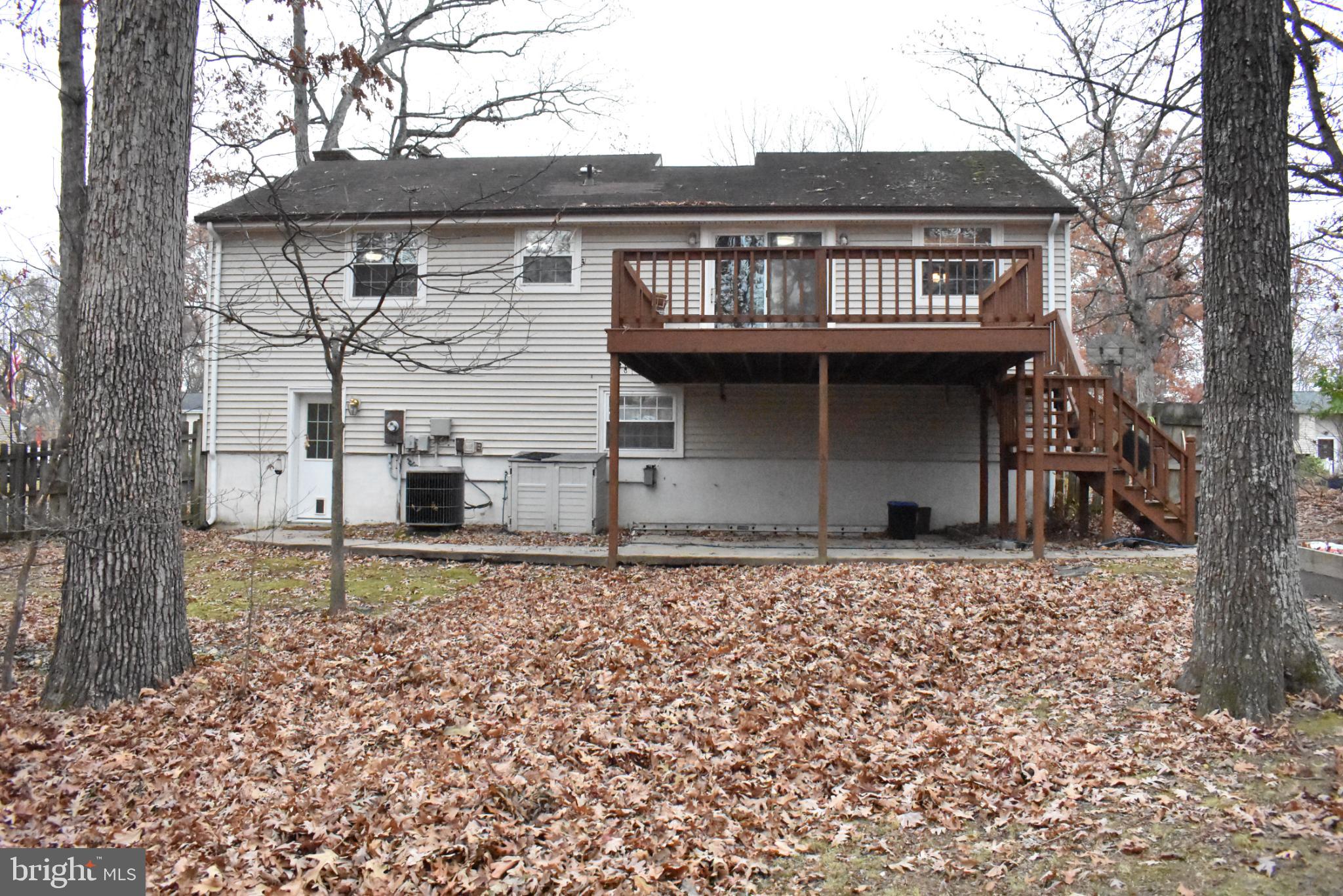 67 Devonne Drive Fredericksburg, VA 22407 - Photo 33 of 35 front view of a house with a fence