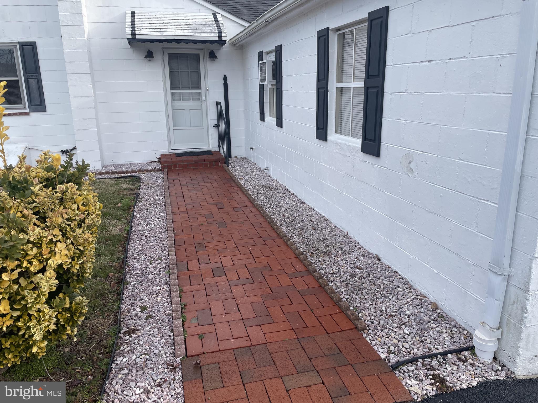 Brick walk to main side entry