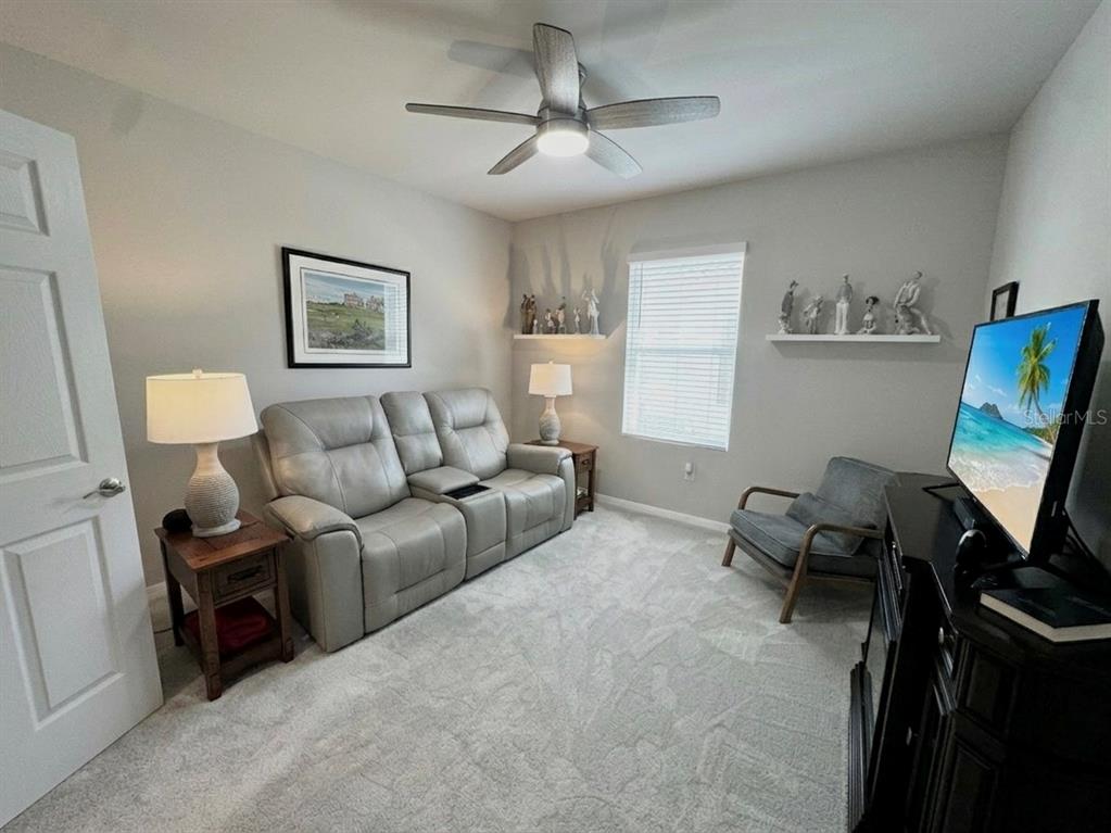 4077 Manatee Lane Punta Gorda, FL 33980 - Photo 30 of 35 a living room with furniture a air conditioner vent and a window
