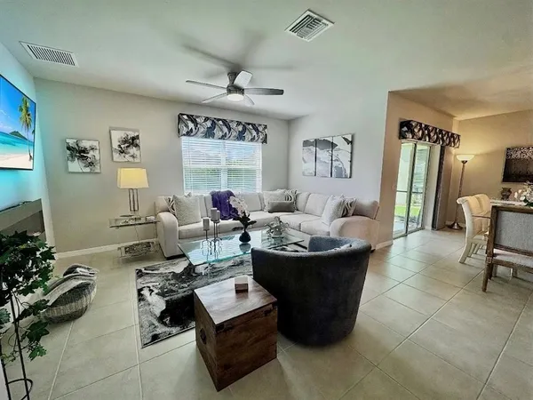 a living room with furniture and a table
