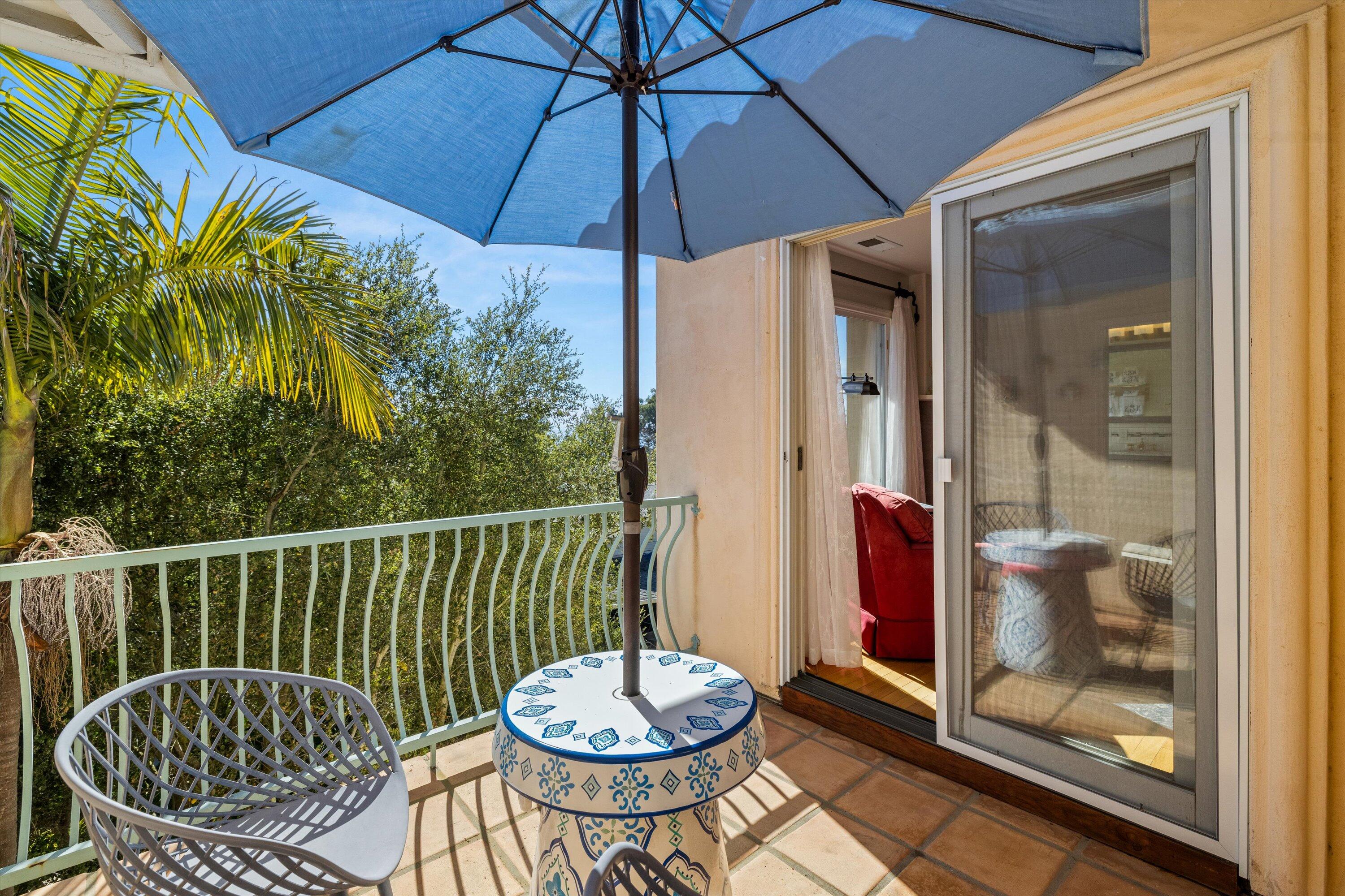 222 Meigs Road, Unit 16 Santa Barbara, CA 93109 - Photo 21 of 44 a view of a chair and table in the patio