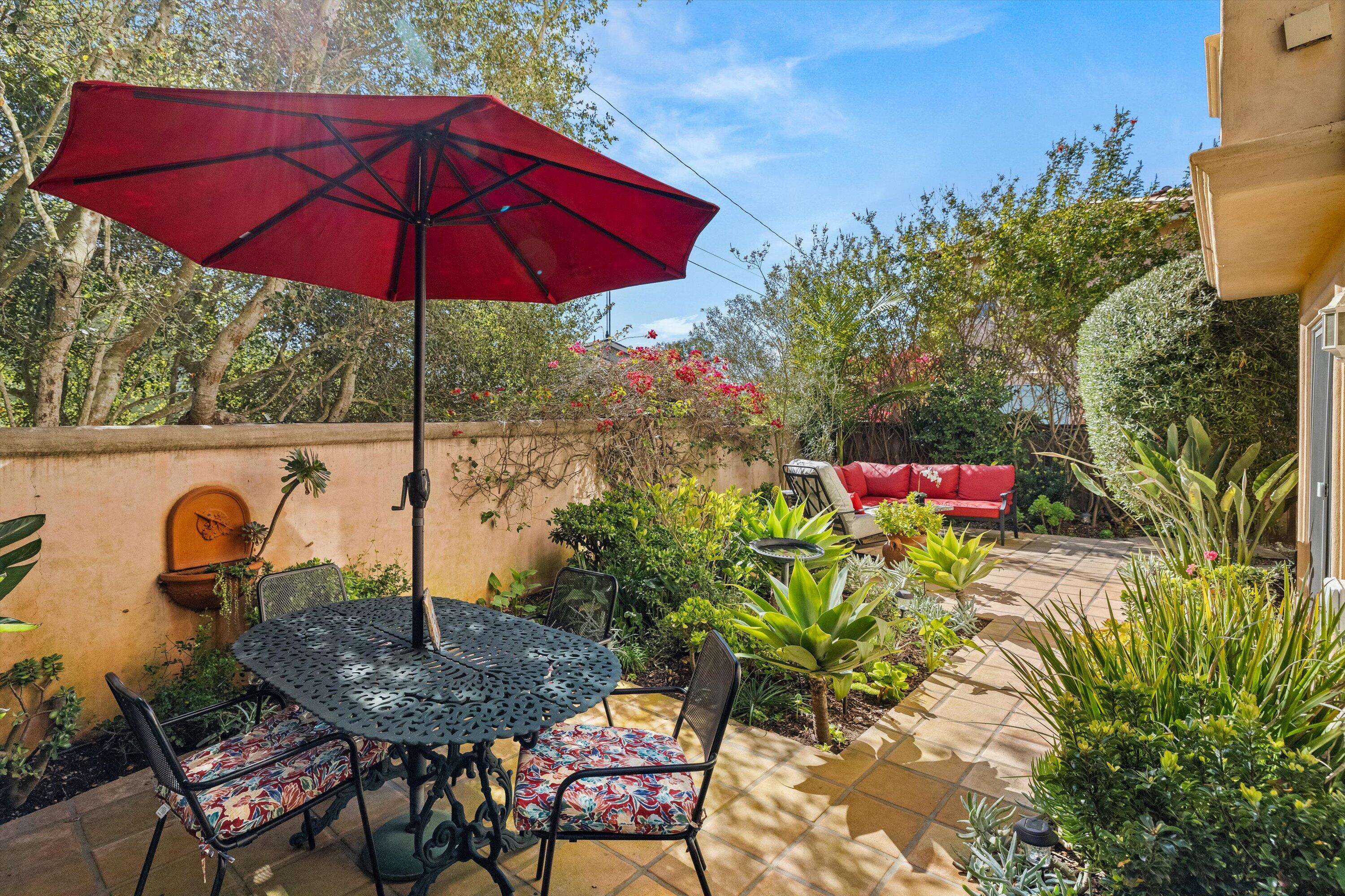 222 Meigs Road, Unit 16 Santa Barbara, CA 93109 - Photo 32 of 44 a table and chairs in the patio