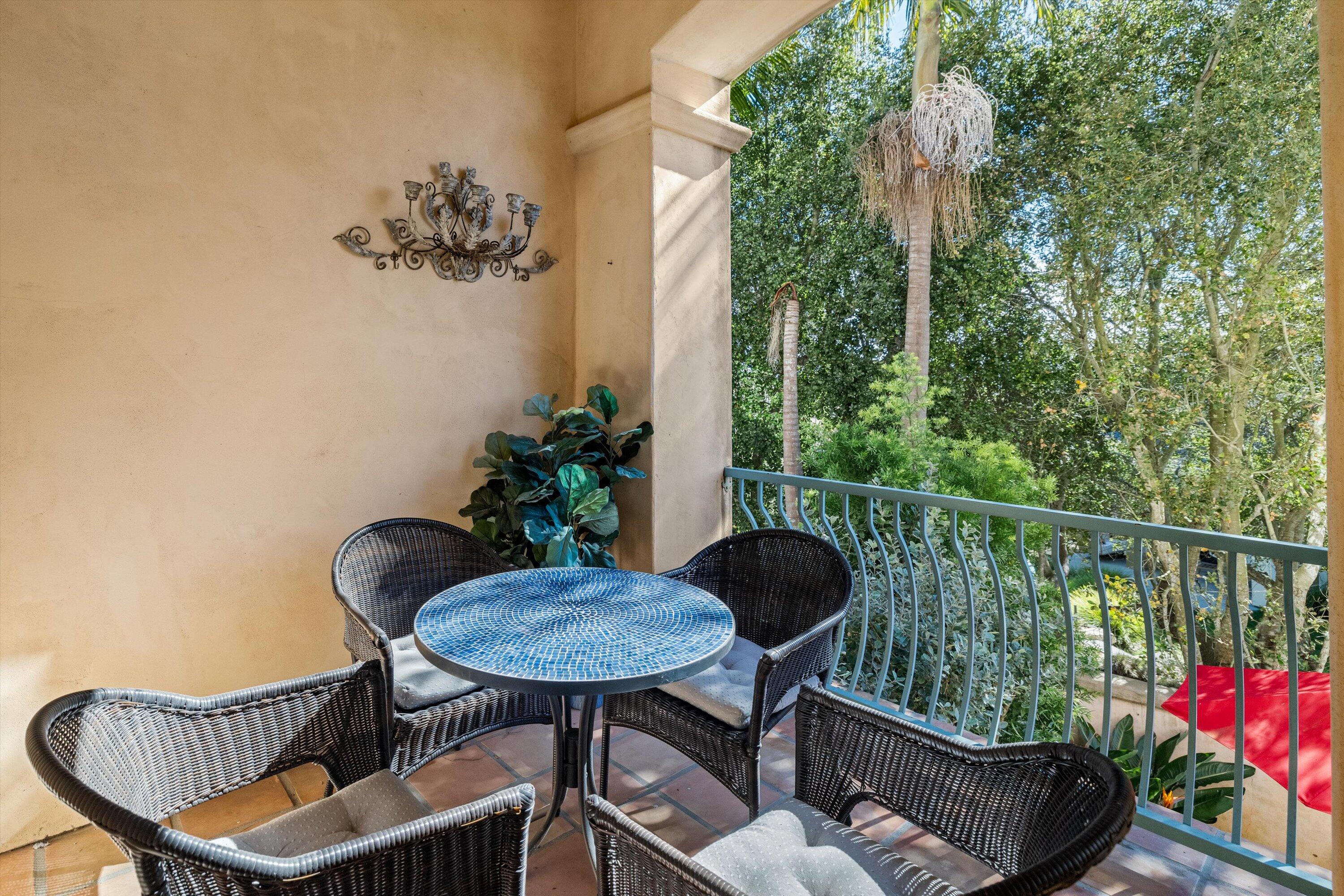 222 Meigs Road, Unit 16 Santa Barbara, CA 93109 - Photo 6 of 44 a balcony with table and chairs