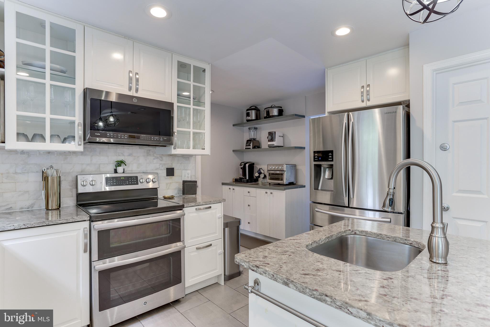 4011 Hummer Road Annandale, VA 22003 - Photo 15 of 56 Stainless steel fridge & beverage bar w/storage
