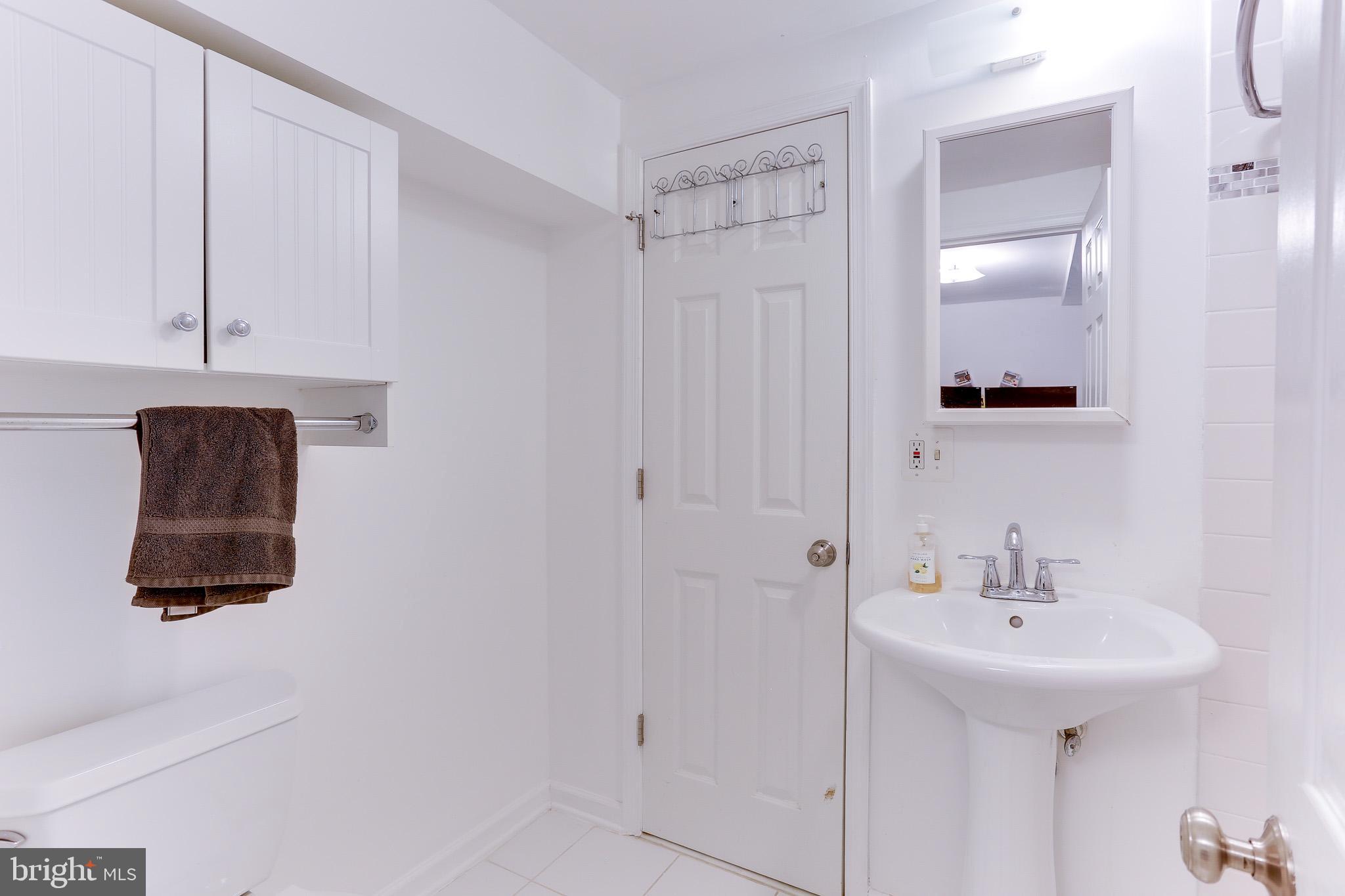 4011 Hummer Road Annandale, VA 22003 - Photo 35 of 56 Lower level bath passes thru to fifth bedroom